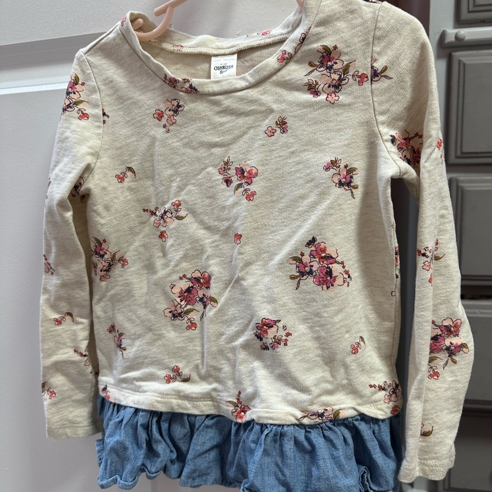 OshKosh floral shirt with chambray ruffle on bottom. Size 5.